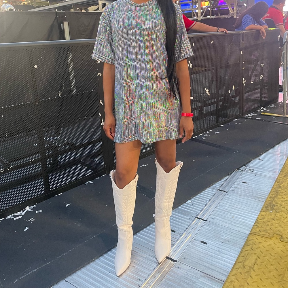 Cream colored knee high boots